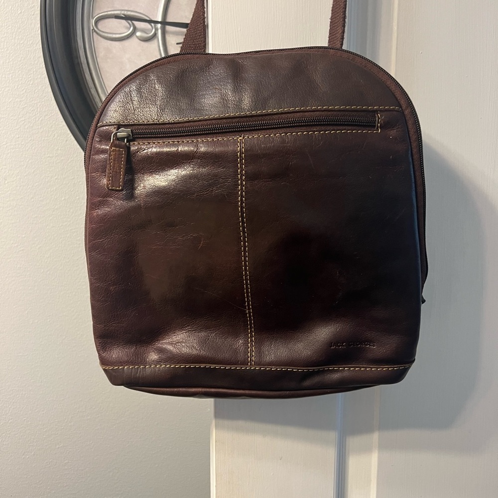 Jack George’s brown leather back pack